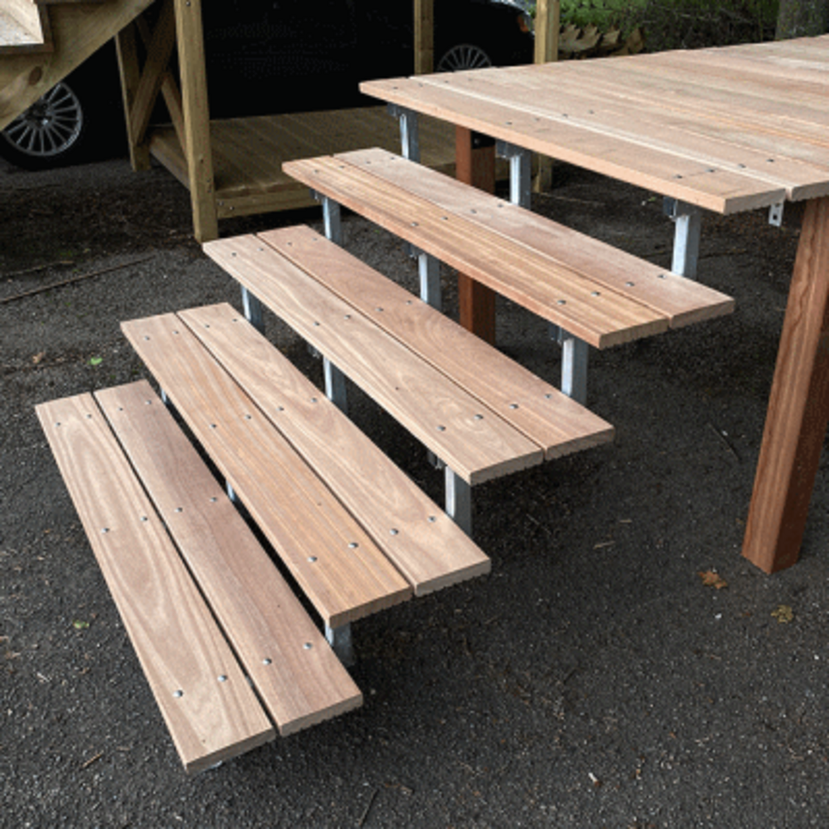 Metal outdoor stairs with hardwood steps