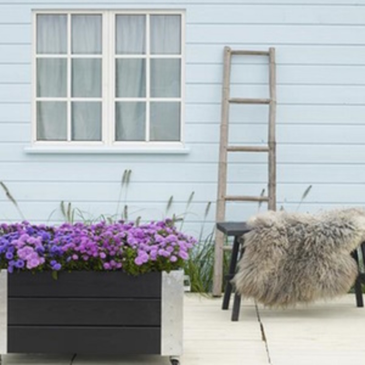 Jardinière sur roulettes pour l'extérieur